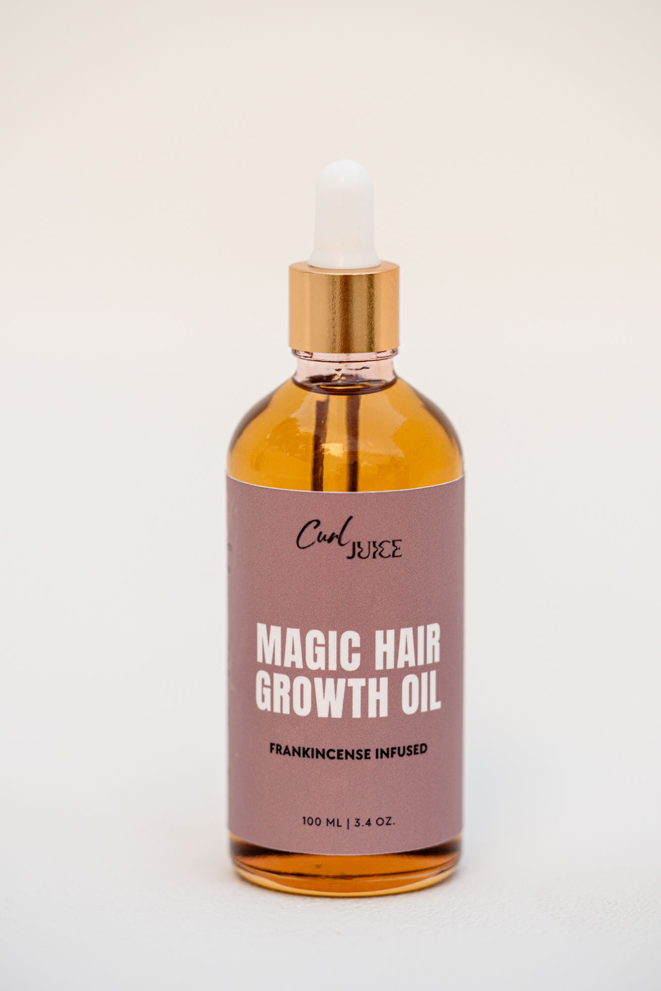 Magic Hair Growth Oil bottle front view